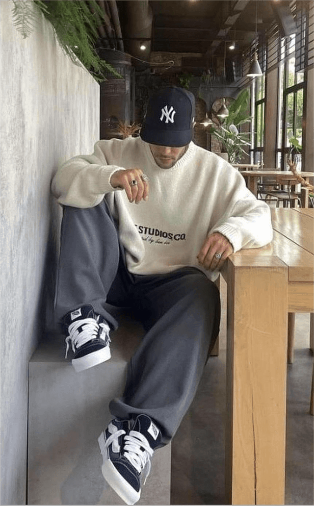 Friends laughing together while using Tell'em